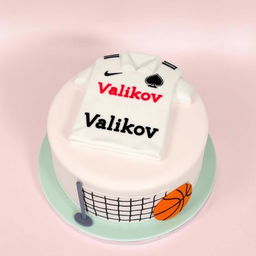 A round cake with a playful and cartoonish design, featuring a white football shirt prominently on top