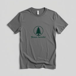 A plain grey t-shirt with a pine tree logo and the text 'FB Dusun Semilir' on the chest, elegantly displayed against a neutral background