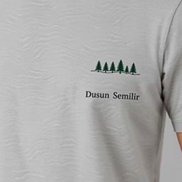 a plain grey t-shirt featuring a row of pine tree logos neatly arranged on the right chest area, complemented by the text 'FB Dusun Semilir'