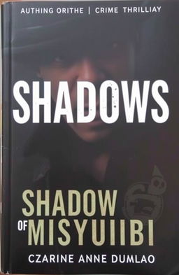 A striking book cover for "Shadows of Misyubibi" featuring a handsome man with half of his face enveloped in shadows, exuding an aura of mystery and intrigue