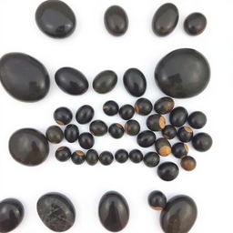 A collection of large and small Apache Tear stones displayed on a pure white backdrop