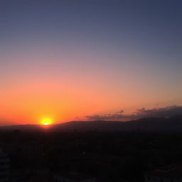 A breathtaking sunset in Lima, with the sun dipping below the horizon and painting the sky in vibrant shades of orange