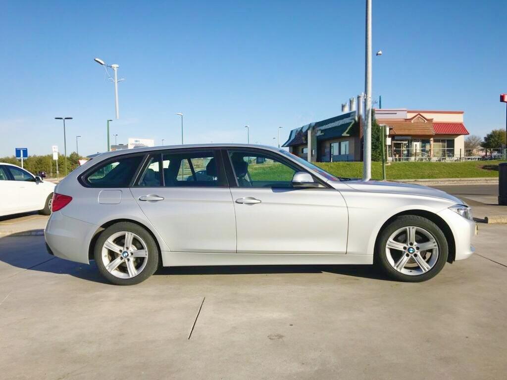 A stylish silver station wagon with sleek, modern rims