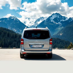 A luxurious Mercedes V-Class minivan parked majestically in a serene mountainous location