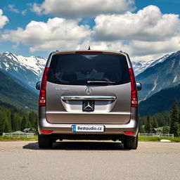 A luxurious Mercedes V-Class minivan parked majestically in a serene mountainous location