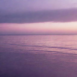 A serene sunset over a calm ocean, with vibrant hues of purple and pink reflected on the water's surface