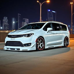 A customized 2023 Chrysler Pacifica featuring an SRT Hellcat-inspired body kit, aggressively styled for a bold and powerful look