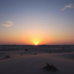 A vast grey desert landscape at sunset with the horizon bathed in soft orange and pink hues