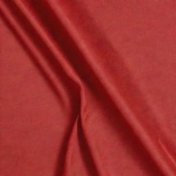 A top-down view of a red fabric with pleasing folds