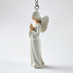 A full view of a standing angel woman statue designed for a key chain, featuring a serene expression and a blindfold covering her eyes