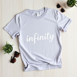 A flat lay image of a simple, classic plain t-shirt designed with the word 'infinity' artistically printed on it