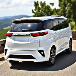 A stunning new white Xpander GLS parked in a scenic outdoor setting