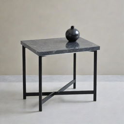 A small, elegant stainless steel black table, topped with grey marble. Perfectly suited for a salon or living room setting.