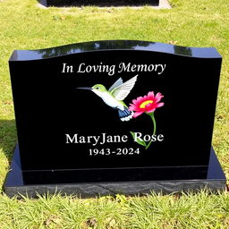 A simple, elegant long rectangular black granite headstone with a flat top, engraved with the words 'In Loving Memory' followed by 'MaryJane Rose 1943-2024'