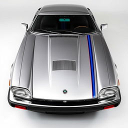 A sleek silver Jaguar XJS Coupe styled after James Bond, featuring twin LED headlights for an iconic appearance