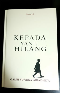 A novel cover for 'KEPADA YANG HILANG', featuring a classic and minimalist design