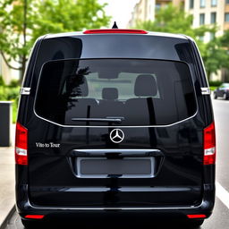 A black Mercedes Vito Tourer with tinted windows in the rear, parked on a city street