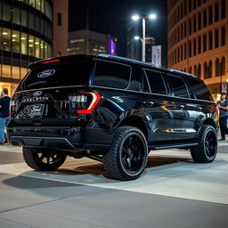 A sleek black Ford Expedition Tremor displayed in an urban environment at night, adorned with dark tinted windows that enhance its stealthy appearance