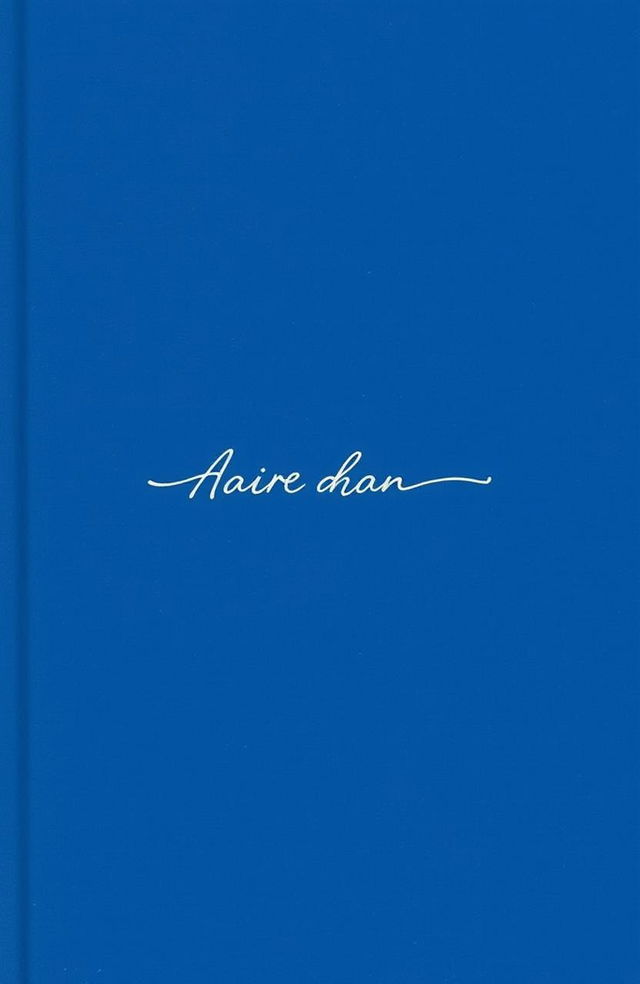 A minimalist book cover featuring a deep, rich blue background that conveys a sense of sadness and melancholy