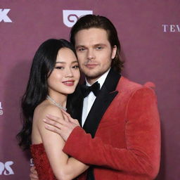 Sebastian Stan and Jennie Kim of Blackpink, both splendidly dressed, cozying up with affection on a striking red carpet