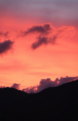 A stunning view of a sunset sky, filled with vibrant shades of orange, pink, and purple blending beautifully