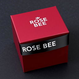 A maroon cartoon-style watch box featuring a striking black text logo that reads 'ROSE BEE'