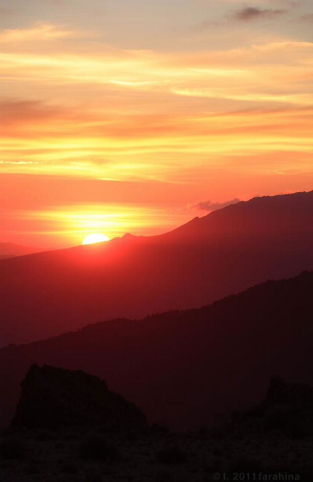 A stunning view of the Atlas Mountains before sunset, showcasing a dramatic landscape