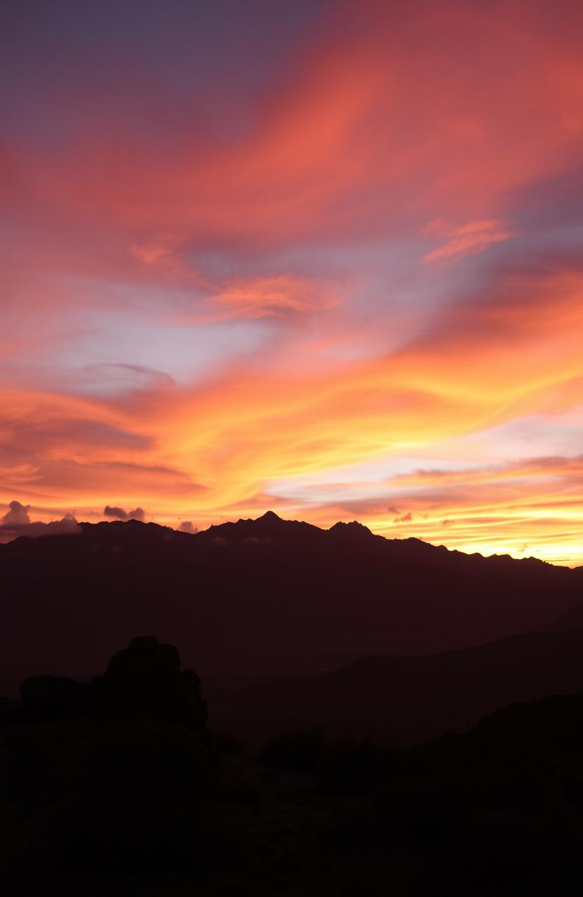 A stunning view of the Atlas Mountains before sunset, showcasing a dramatic landscape