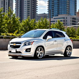 A stunning white 2012 Chevrolet Trax, lowered and beautifully stanced, showcasing its sporty appeal