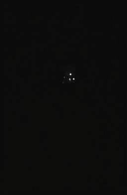 A person trapped in darkness, surrounded by shadows, evoking a feeling of entrapment
