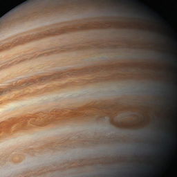 Visualize Jupiter, the largest planet in our solar system with its familiar brown-orange thick bands of atmosphere, swirled by massive storms including the iconic Great Red Spot