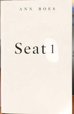 The book cover features the title 'Seat 1C' in a simple, elegant font