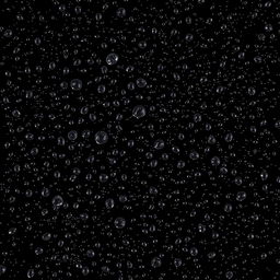 A captivating scene featuring numerous small water droplets scattered across a pitch black background