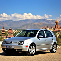 A 2003 Volkswagen Golf 4 Turbo Diesel parked in front of the scenic backdrop of Bishkek, Kyrgyzstan