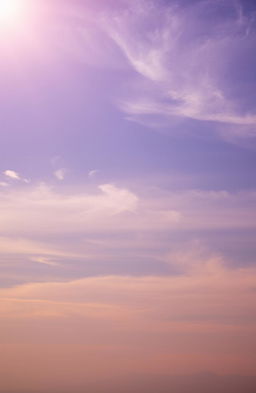 A breathtaking limitless sky, depicting an expanse of vibrant colors transitioning seamlessly from deep azure to soft lavender