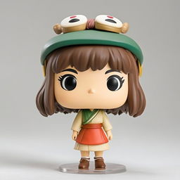 A Studio Ghibli-themed Funko Pop vinyl figure of Chihiro from 'Spirited Away', standing against a white background.