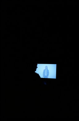 A minimalist image in dark tones with hints of deep blue