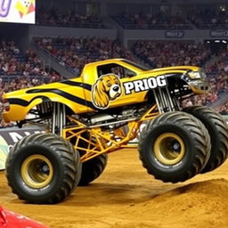 A striking gold and black monster truck adorned with a logo featuring the face of a cocker spaniel and the word 'PROG' prominently displayed