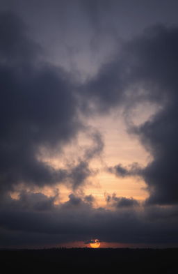 A stunning yet gloomy cloudy sunset sky filled with thick, dark gray clouds swirling together as the sun sets in the background, casting a subtle glow of muted orange and deep purple hues across the sky