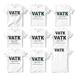 A collection of white T-shirts featuring the text 'VATK' along with 'Высший агротехнический колледж'