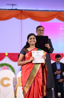 A 20-year-old girl receiving her degree on stage at a ceremony titled 'ICSI'