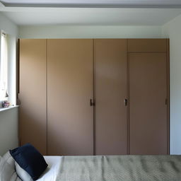 A beautifully arranged room containing a comfortable queen size bed, a neatly arranged study table with lamp, and a large 5-door wardrobe with ample storage space.