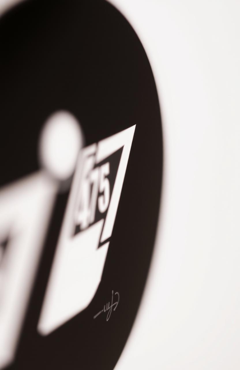 A close-up shot focusing on the number 475 displayed in a bold, modern font