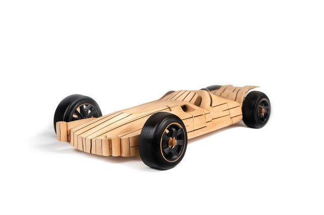 A high-quality digital art image of an unpainted pinewood derby car, expertly carved from a single block of pinewood