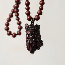 A beautifully crafted maroon-colored wooden necklace featuring a detailed pendant shaped like the head of a majestic Persian king