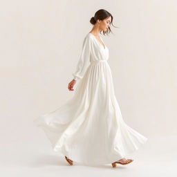 A beautiful, modern, long, loose, and comfortable dress with long sleeves made of white silk