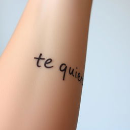 A close-up image of a human arm with the phrase 'te quiero' (I love you) written on it, but the text appears to be partially erased as if it has been rubbed off