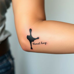 A modern black tattoo ink blot design, resembling an abstract drip or spill, featuring delicate script underneath it to suggest a hidden message
