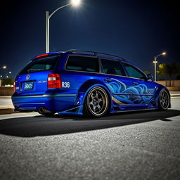 A stunning blue 2001 widebody VW Passat R36 wagon designed as a drift car, featuring an eye-catching street livery