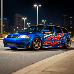 A striking blue 2001 widebody VW Passat R36 wagon, configured as a drift car with a bold race livery, is parked at night